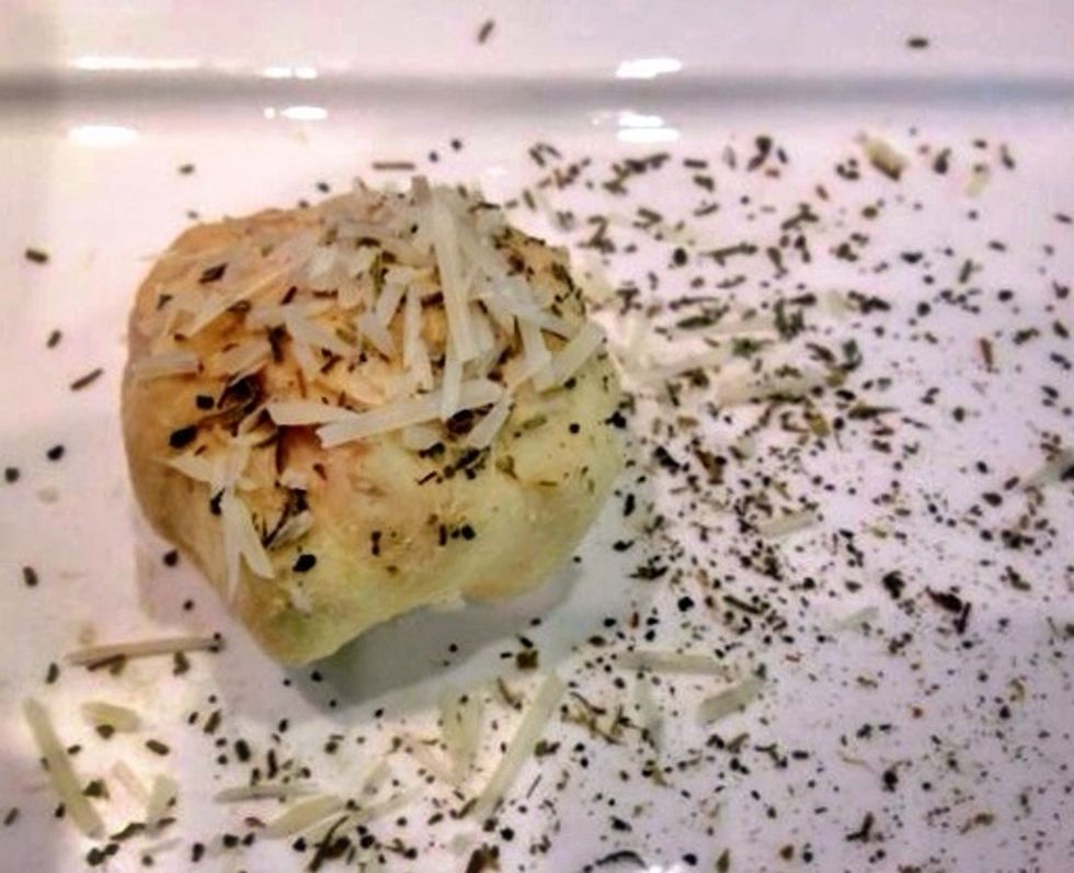 Pull up sides and seal each filled round. Sprinkle with Italian seasoning and Parmesan....
