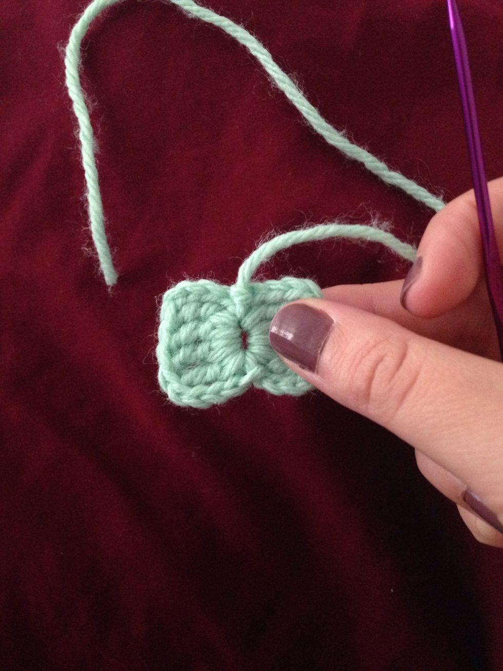Pull yarn through loop.