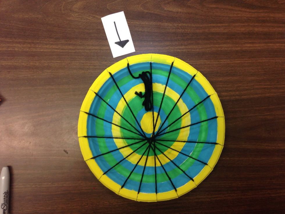 Pull your yarn forward through the last notch. You're ready for Ms. Bergmann to show you how to weave!