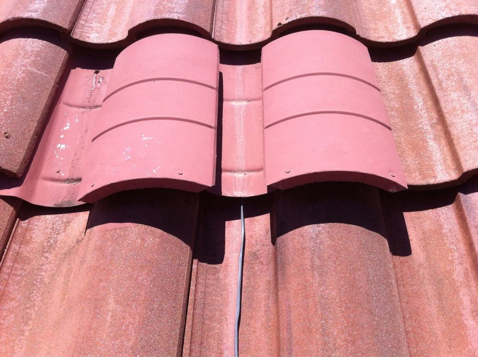 Pulled 16 gauge wire through attic and pushed out vent