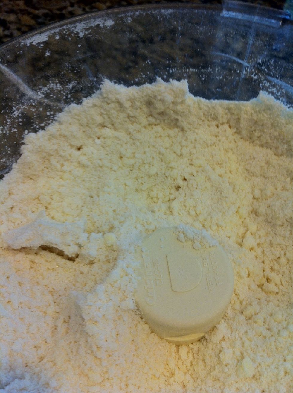 Pulse all the DRY ingredients first until it looks crumbly and grainy