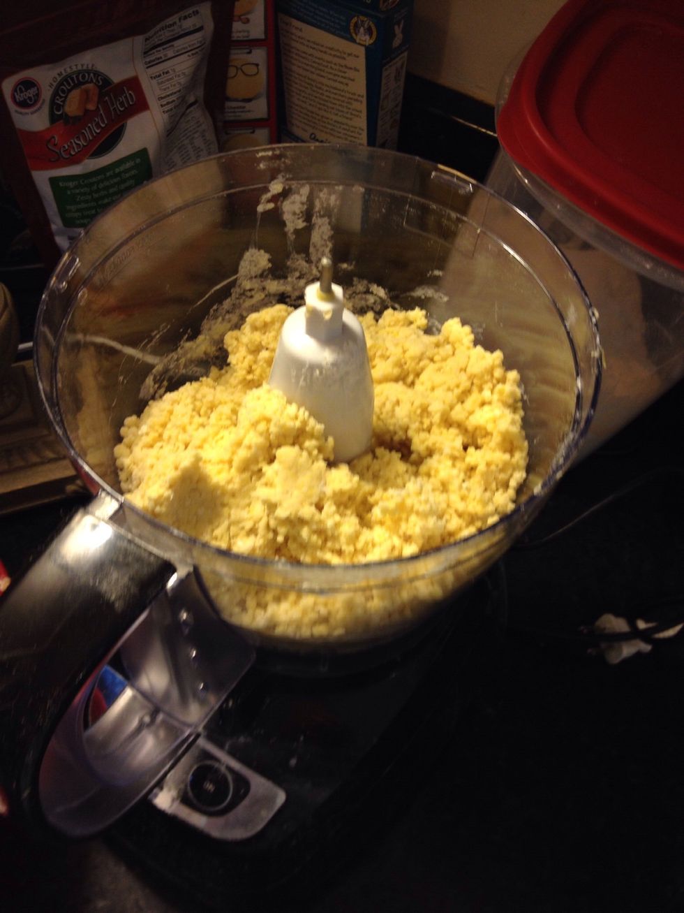 Pulse for 30-60 seconds, until combined. If it's too sticky, add flour. If it's too dry, add just a little water.