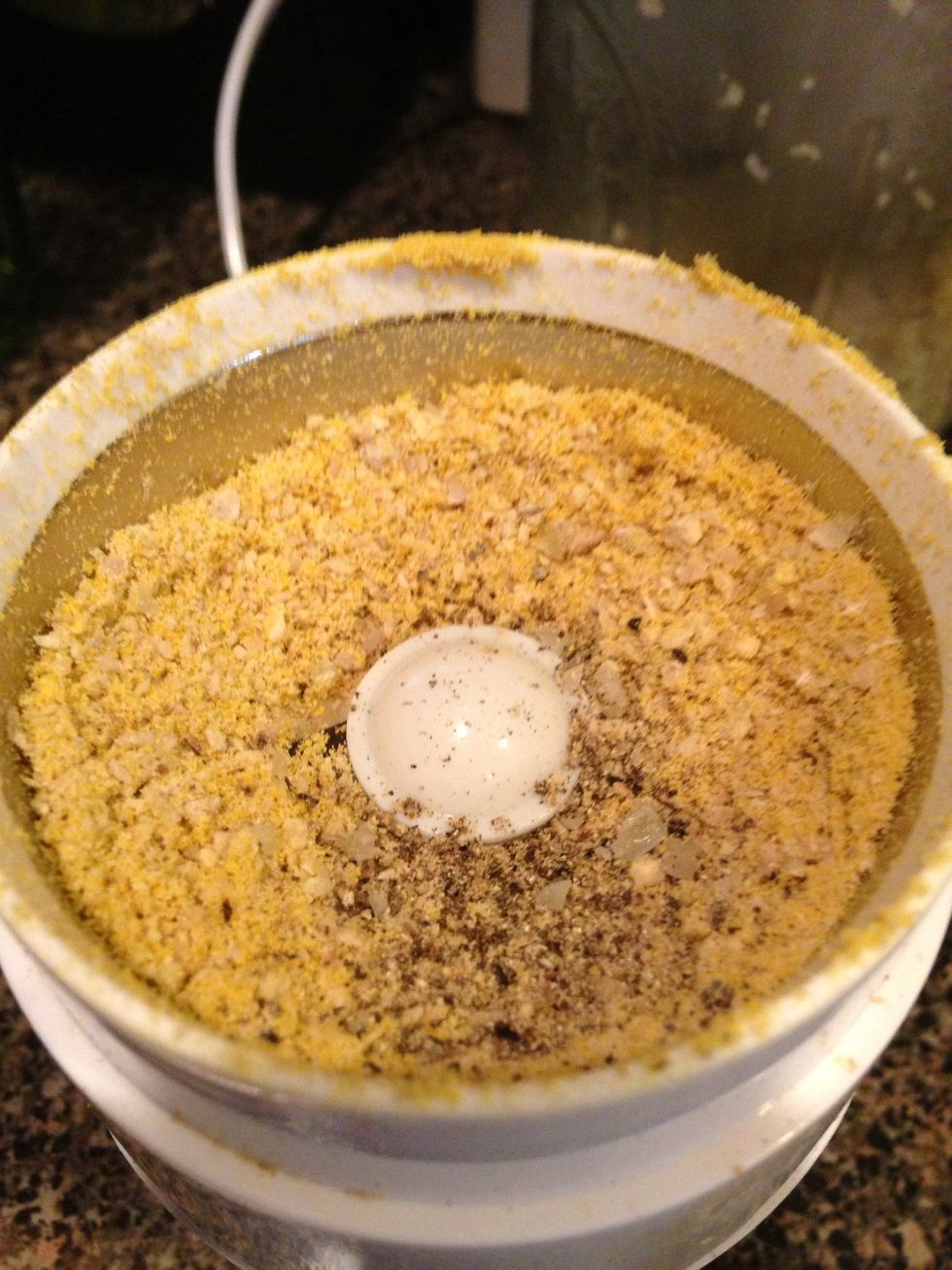 Pulse until it looks like this, then add in your SMALL pinch of sea salt and a little black pepper. Pulse a few more times until mixed.