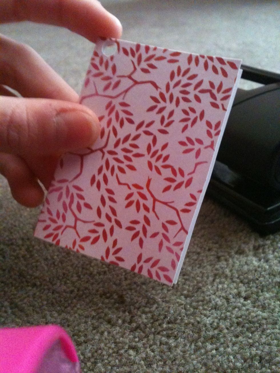 Punch a hole in the corner with a hole puncher