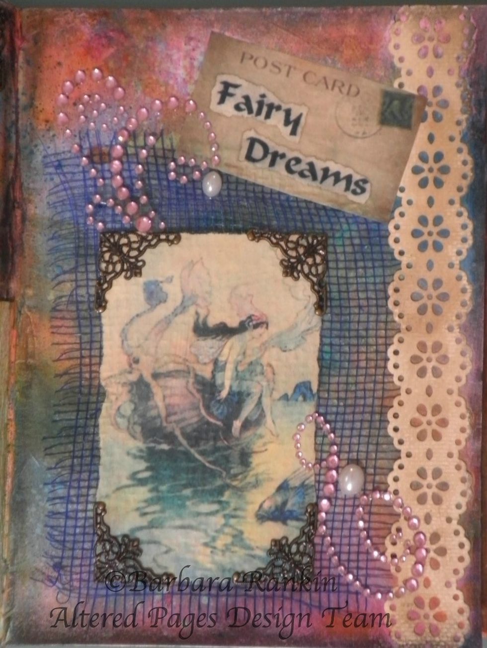 Punch decorative strip from ivory card stock and adhere to right side of page with matte medium. Dry brush with DecoArt Raw Umber Antiquing Cream. Add gem swirls and metal corners, as shown.