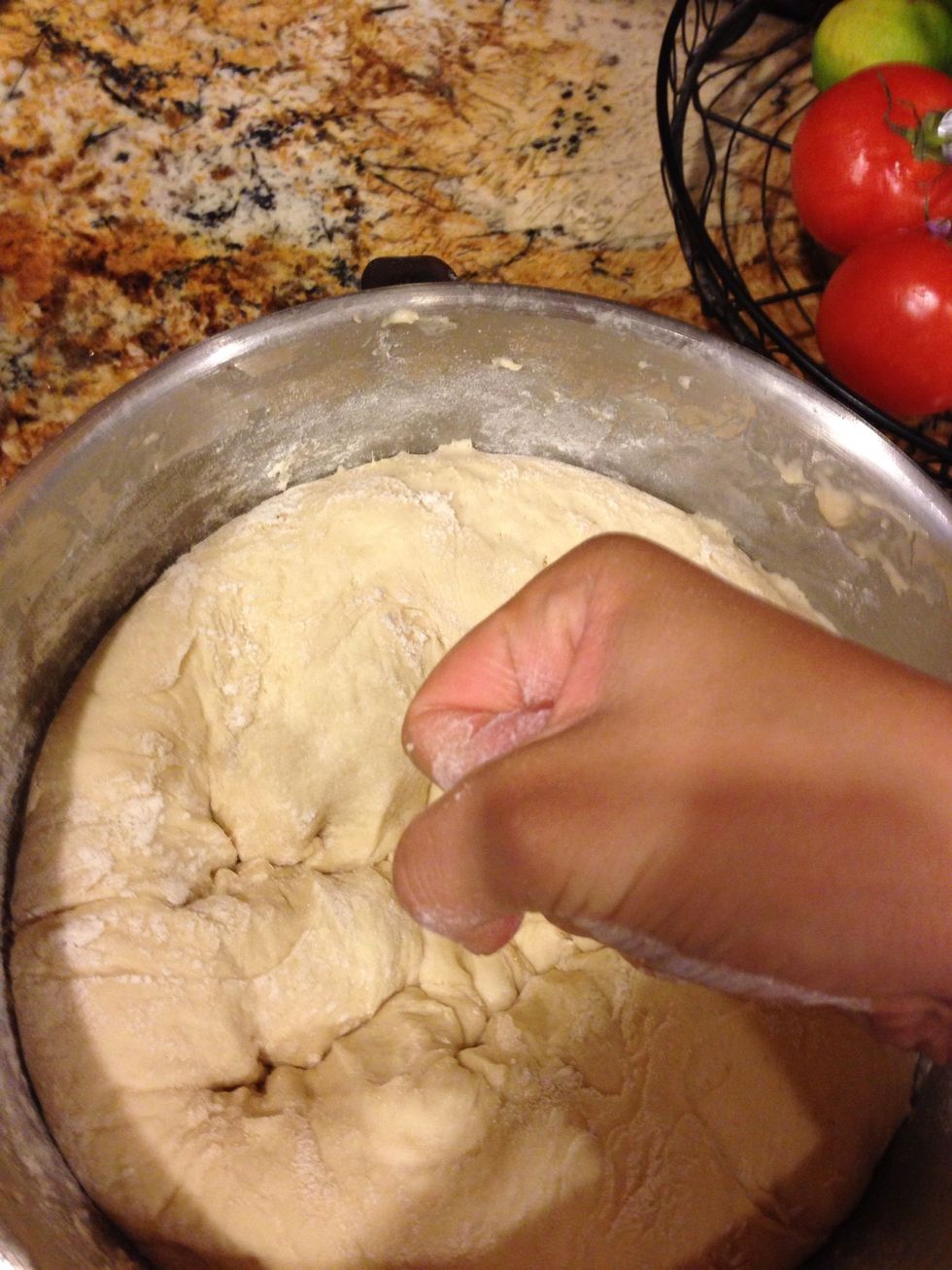 Punch down dough. My favorite part. ;)