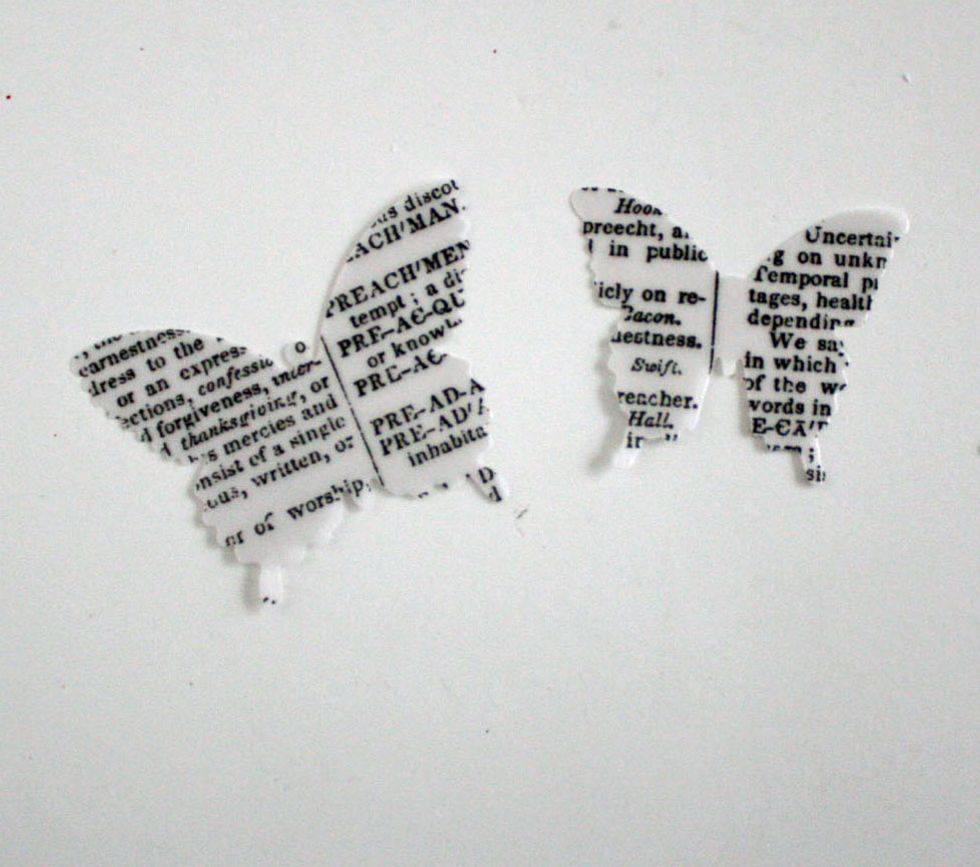 Punch out two different sized butterflies