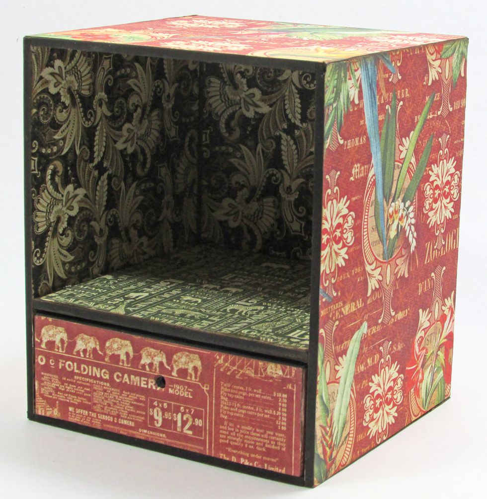 Punch the hole in the drawer for the handle.