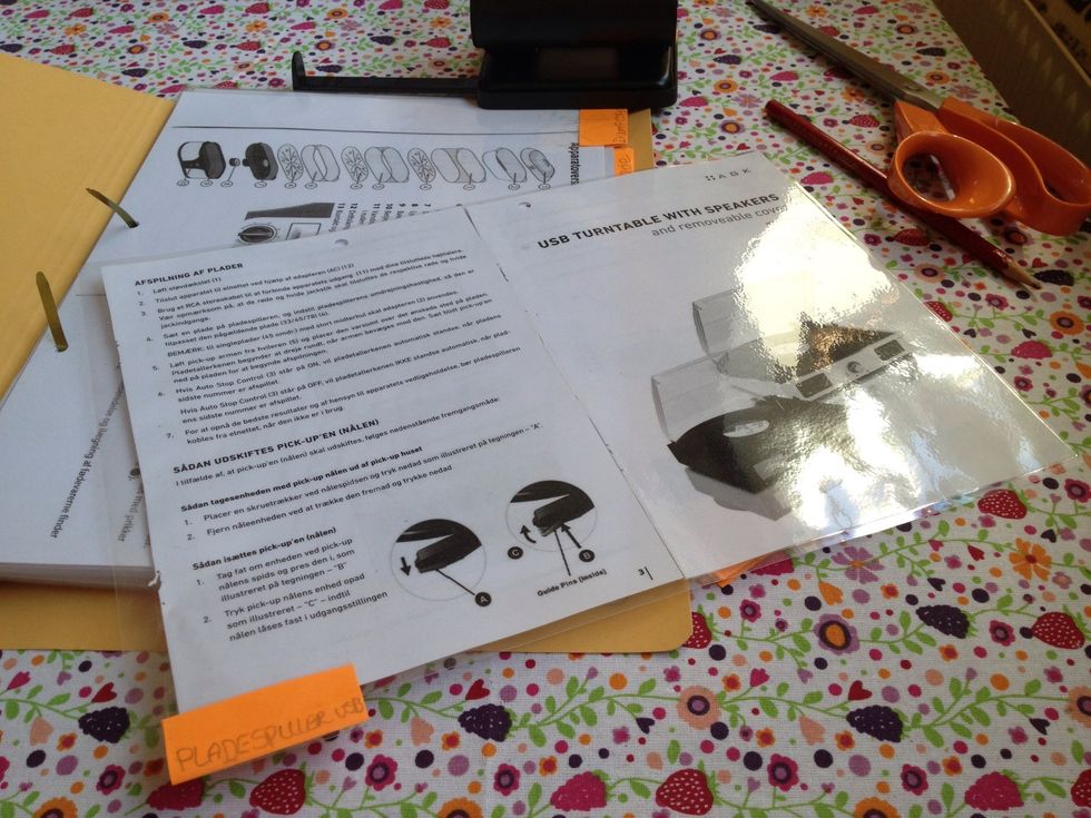 Punched holes for the folder and made markers using post-it notes and tape.