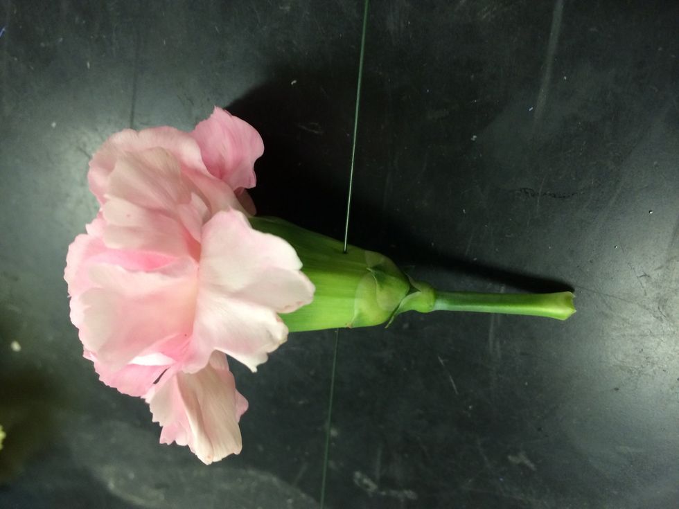 puncture the flower with a piece of wire using the piercing method: