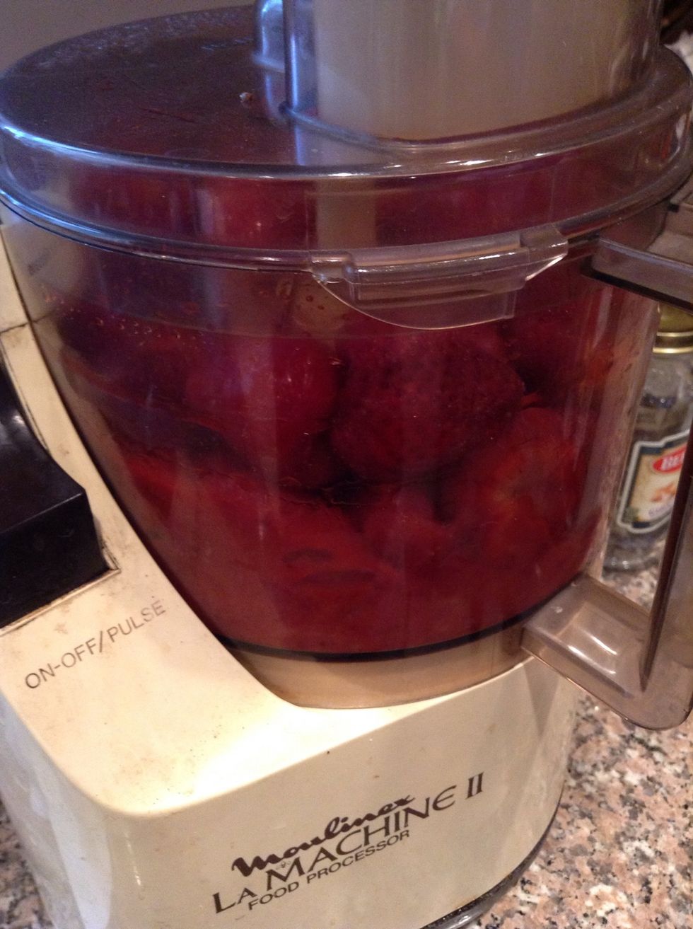 Pur\u00e9e strawberries.