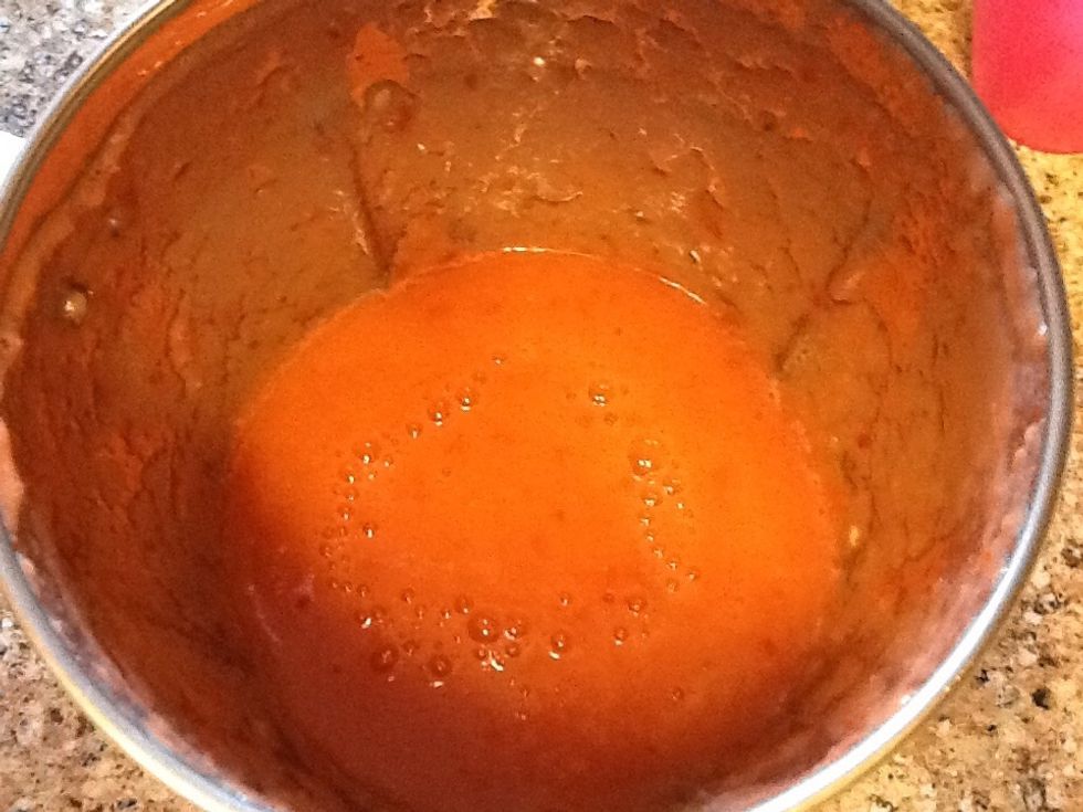 Pur\u00e9e tomato, green chillies, , garlic, cumin and coriander seeds.