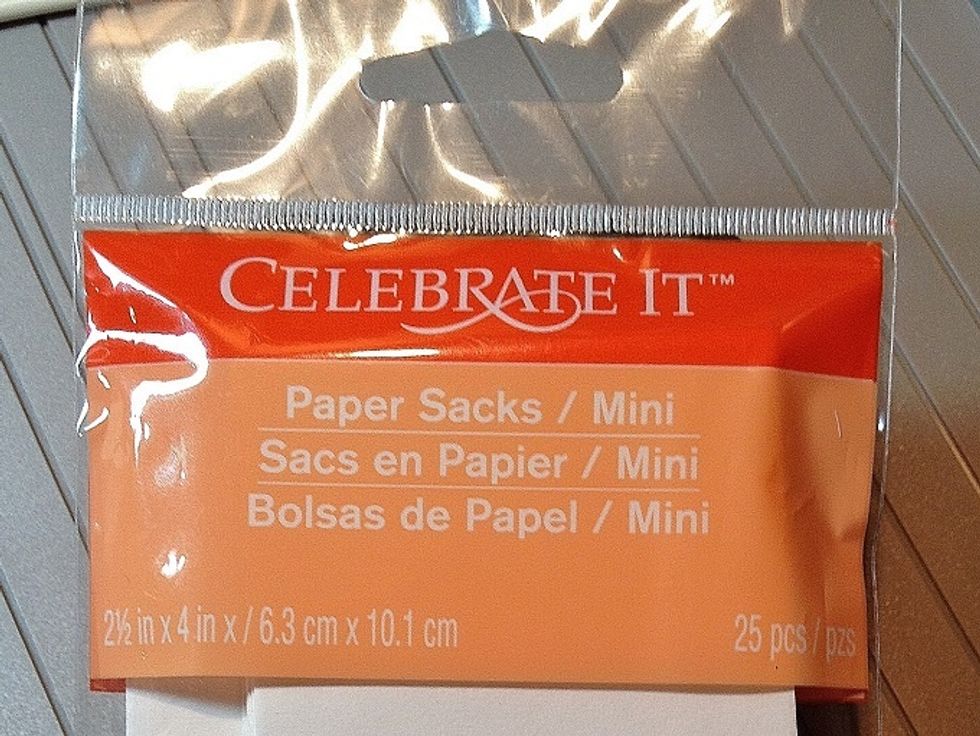 Purchase a pack of 2.5" x 4" white gift bags.
