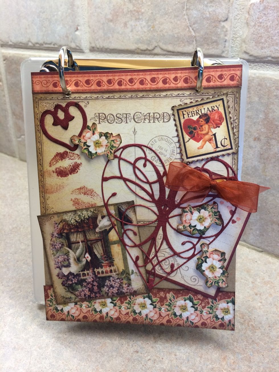 Purchase easel with rings at top then punch holes to fit each monthly pocket. Put a card in each month listing important sates: Anniversary's Birthdays events that happen each year.