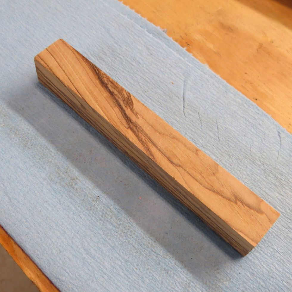 Purchase or cut out a piece of wood 3/4in by 3/4in by 6in long. Choose wood with nice grain patterns. The one pictured is Bethlehem Olive from the Holy Land.