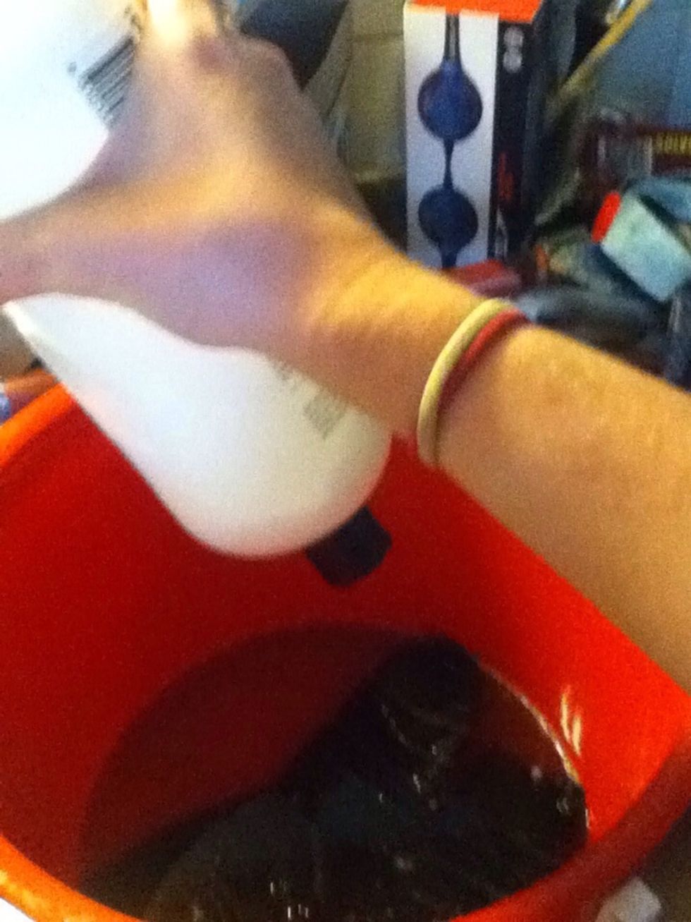 Pure about half a cup of conditioner in your bucket and swirl it around. Leave it to soak for about ten minutes