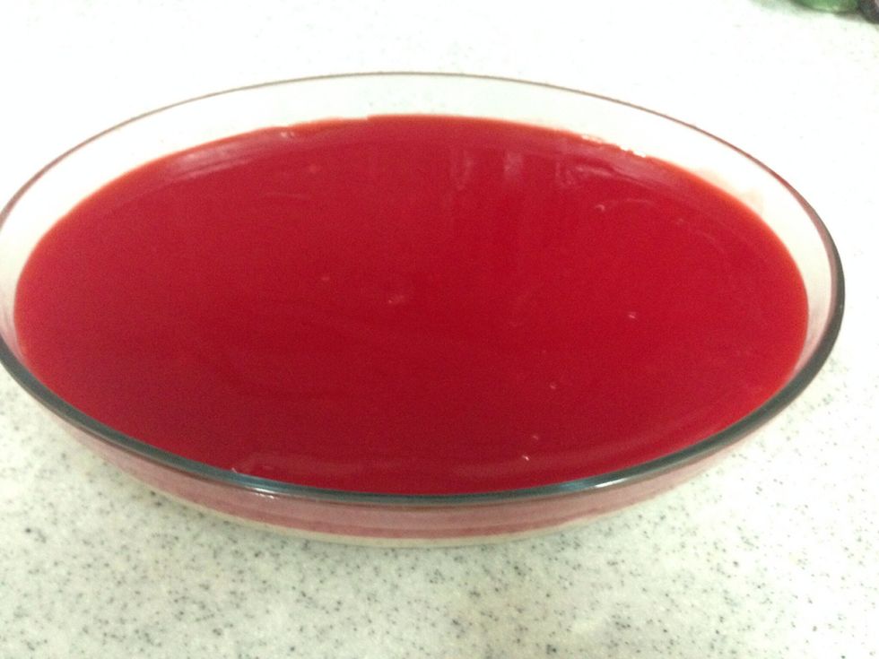 Pure the jello over the frosty cream .( If you like the pomegranate inside the jello put it in this step ) .