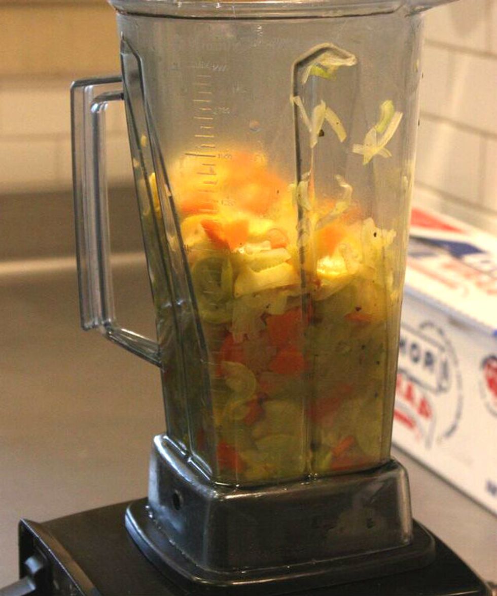 Puree the soup in a blender. Only fill the blender half way and make sure there is enough liquid in the blender to puree properly.