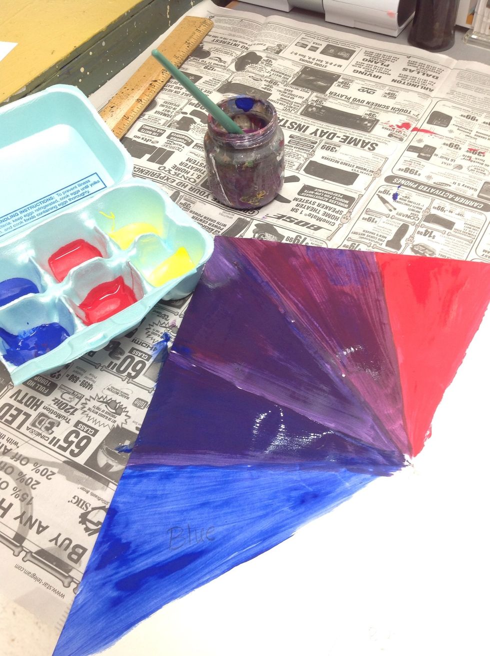 PURPLE! Add a little more red to the mixture and paint it next to red. A little more blue to the mixture next to blue. The artist has now created a secondary color and two Intermediate colors.