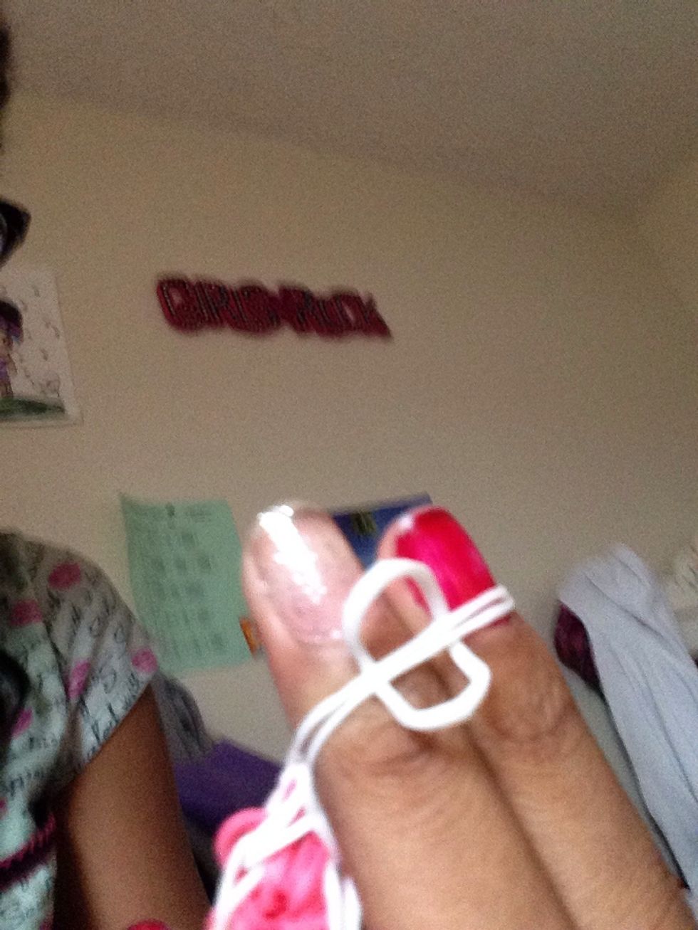 Push a band through the first ones.