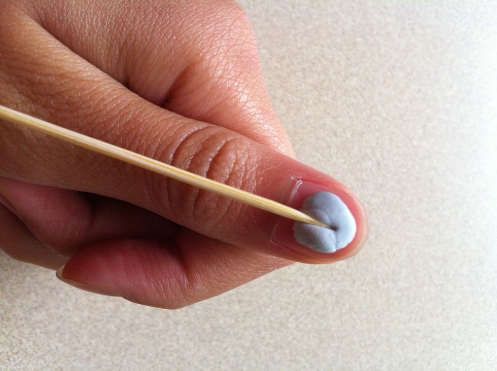 Push a toothpick into it like this