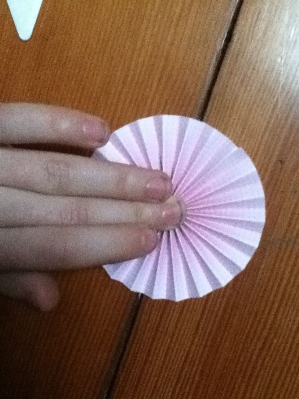 Push and shape to form a ring. It is ok to let it spring up now, and to just push it down again when you start the next step.