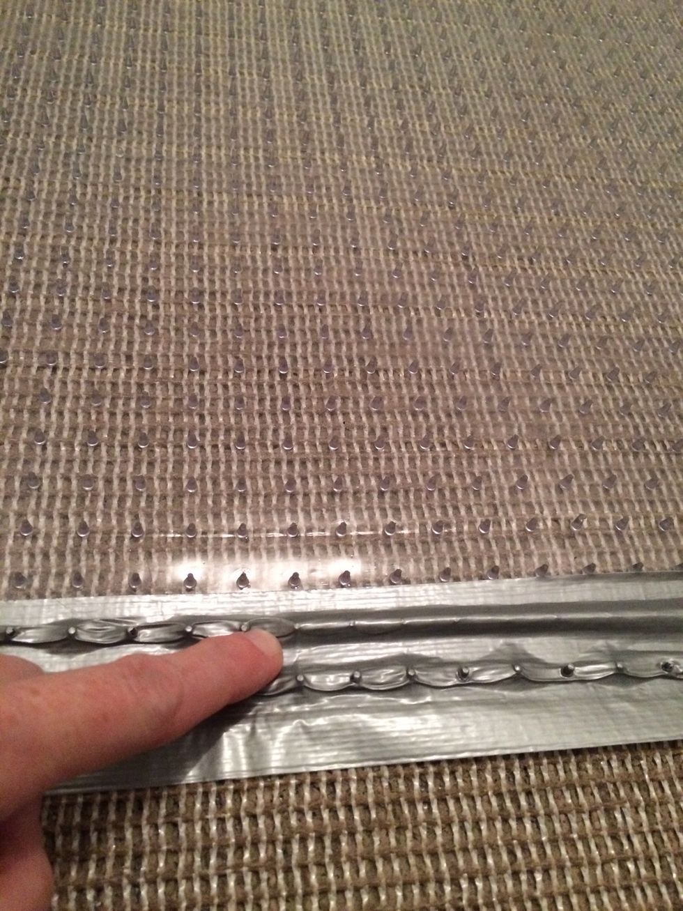 How to secure an area rug over carpet B+C Guides