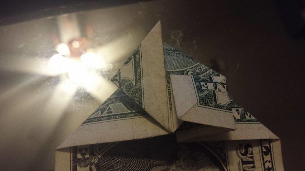 Push down and it should form a square.