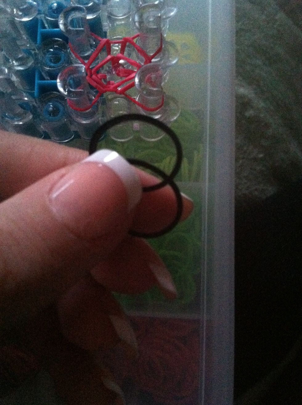 Push down the red band and we're starting on the bobble.. Take TWO black bands