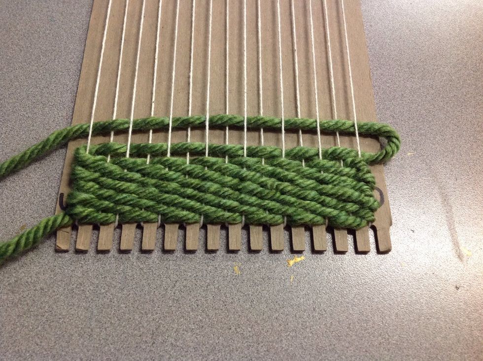 Push down the weaving as you work. A good weaving doesn't show any of the warp.