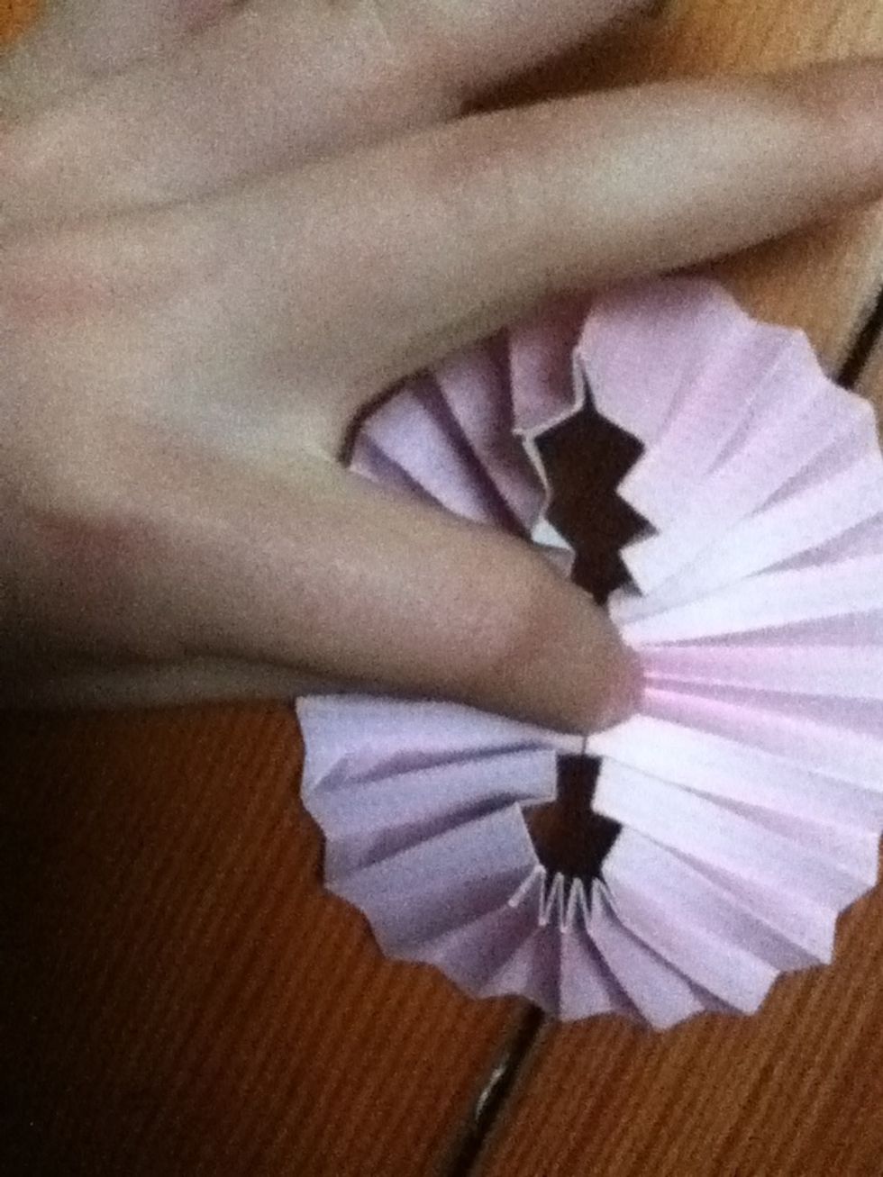 Push downward to flatten.