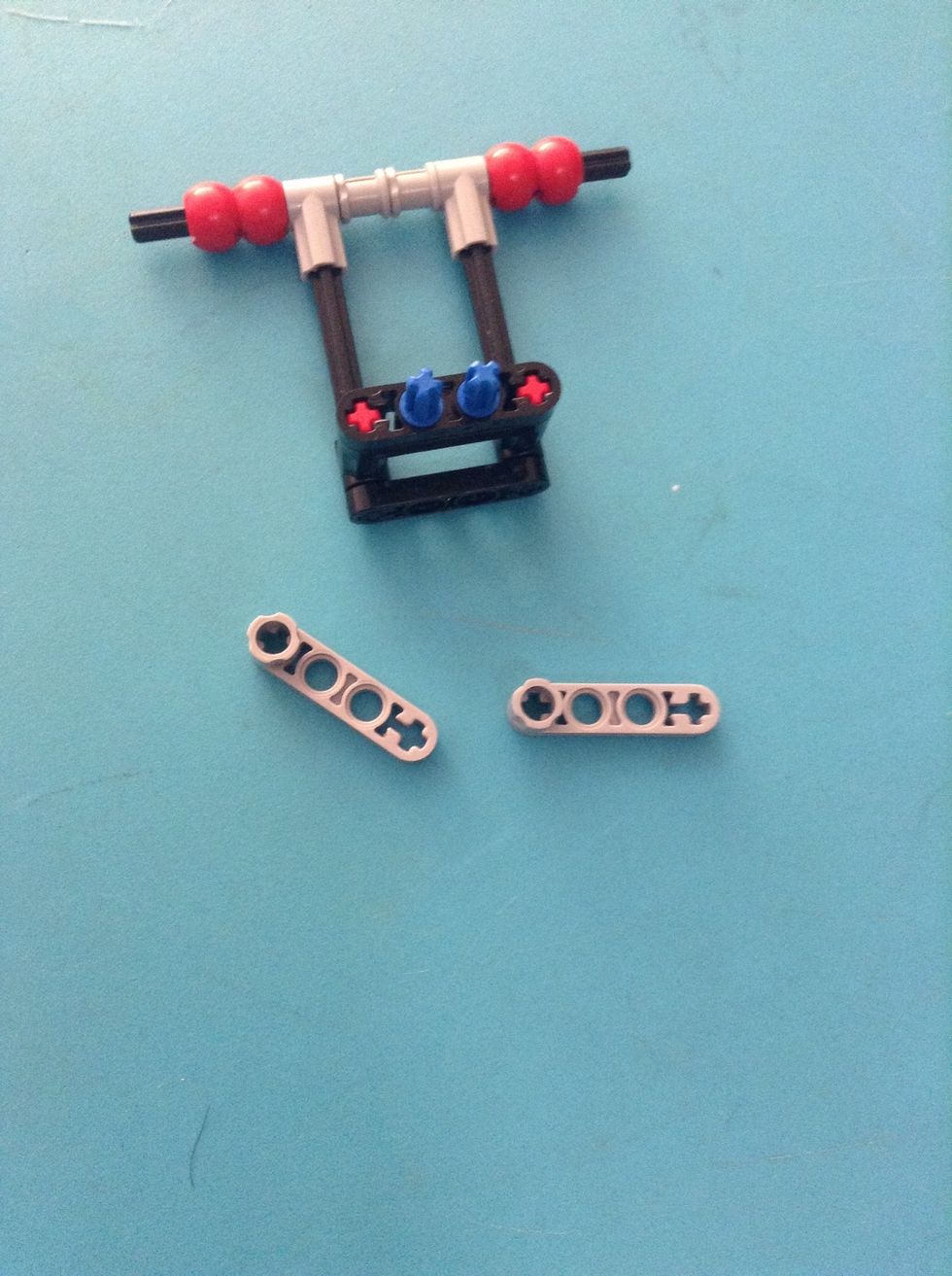 Push in the axle pegs