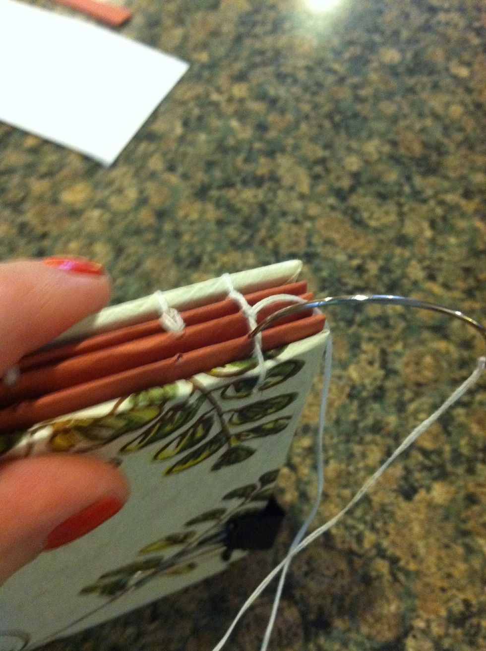 Push needle through third signature first staton