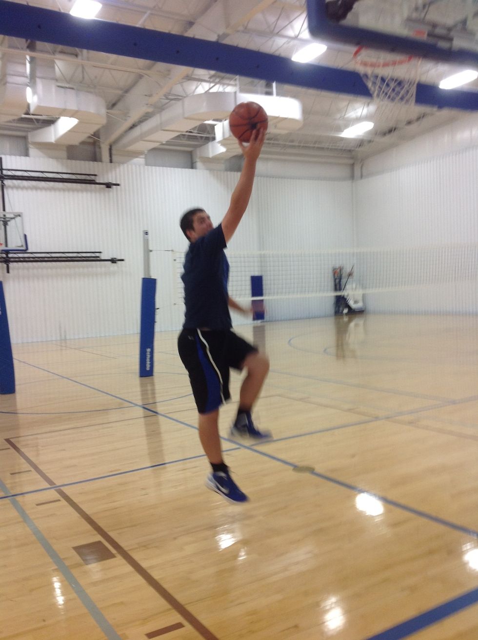 Push off your left foot while shooting with your right arm.