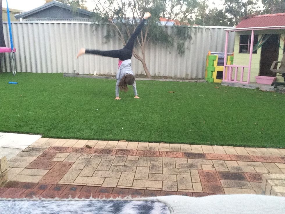 Push on your preferred leg, reach out to the ground and swing your legs over to the other side.