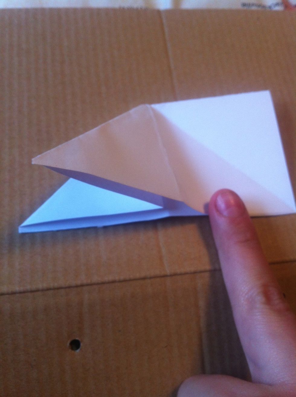 Push side of paper into center.