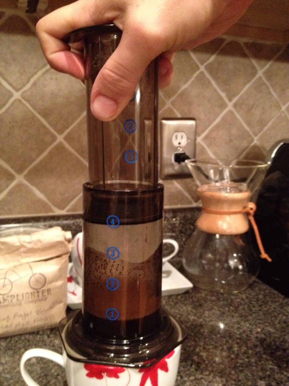 Push straight down at a steady place. It should take about 30 seconds to get to the 2 mark.