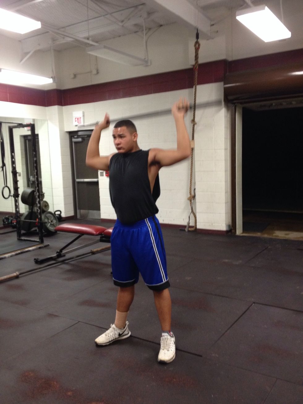 Push the bar up with your arms and legs.