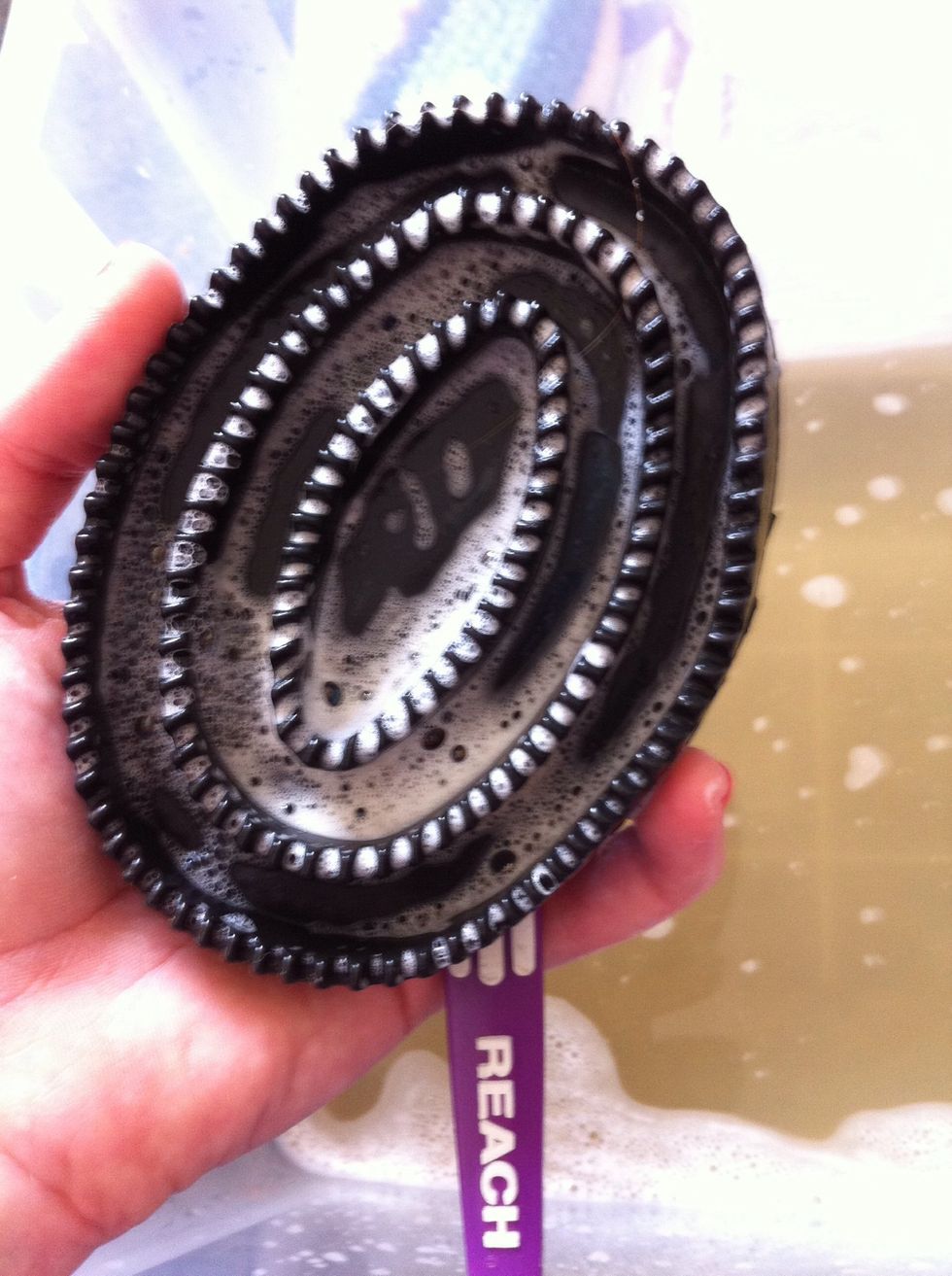 Push the brush between the 'rows' of teeth. Don't forget the back!