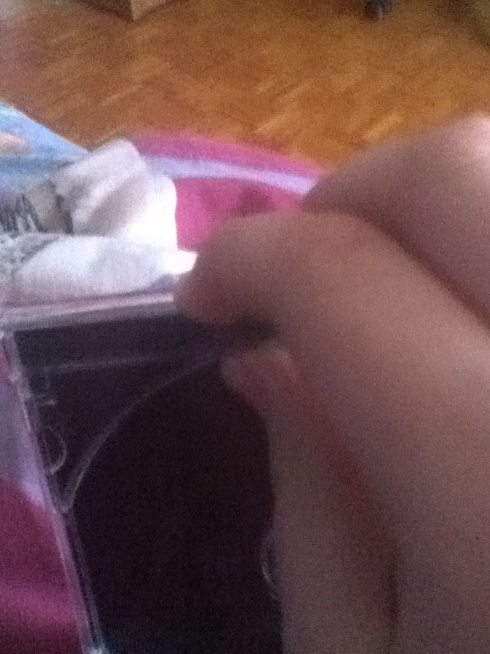 Push the cd holder up so it can go off.ATTENTION:it may make a breaking noise.Don't worry,it's not broken.