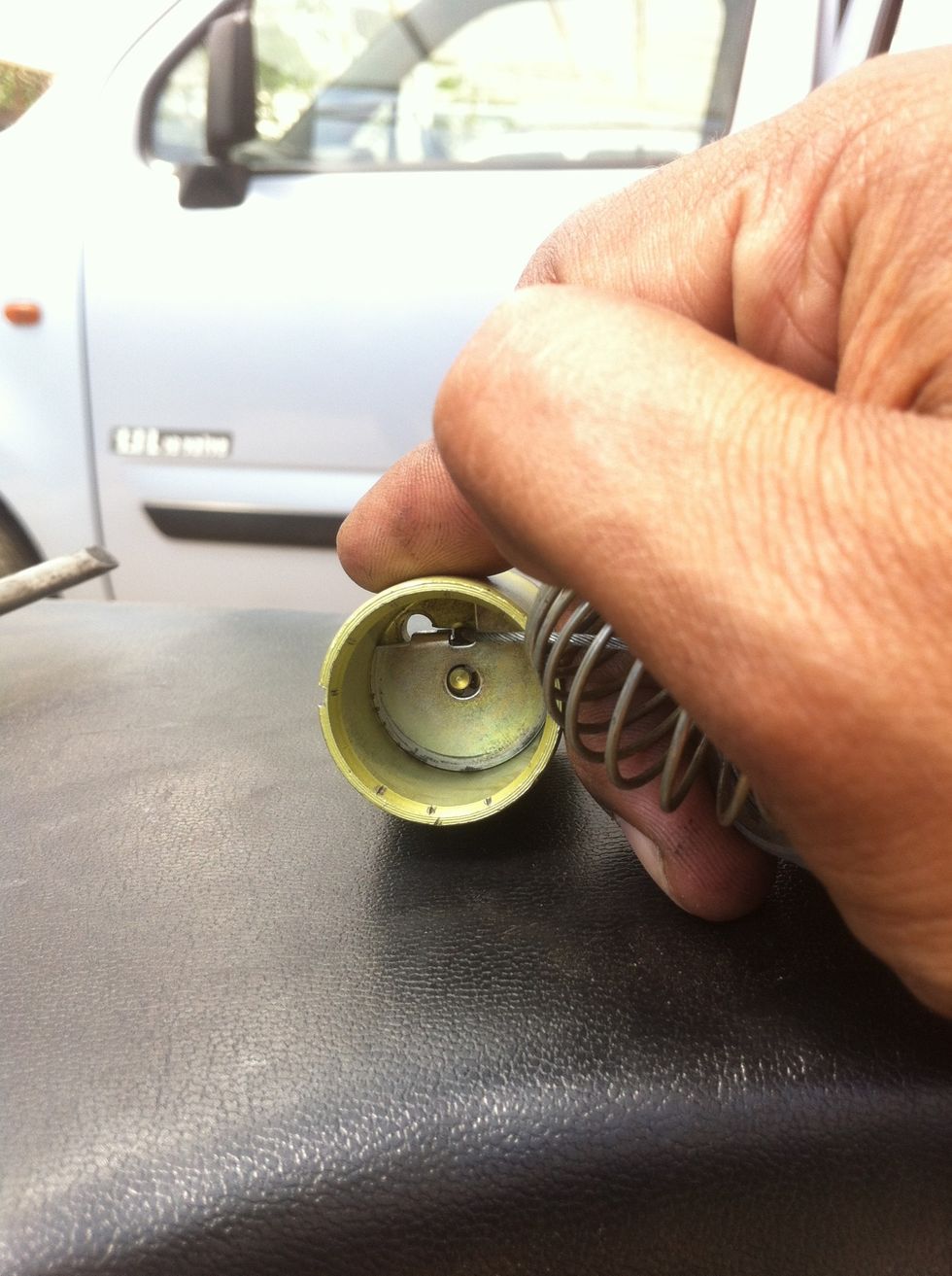 Push the clip for locking the cable in place.