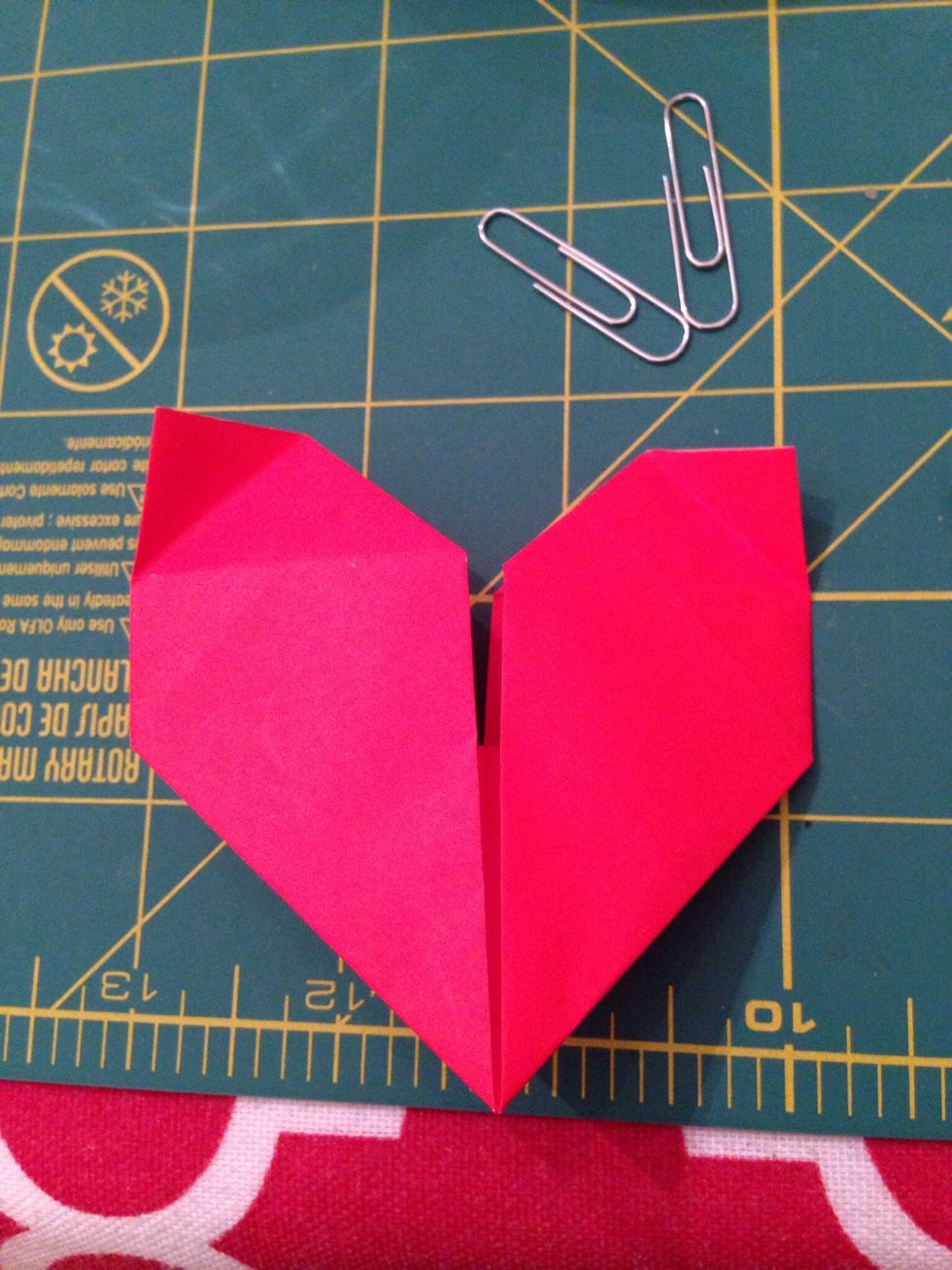 Push the corners in between the layers using the folds you just made as your guide.