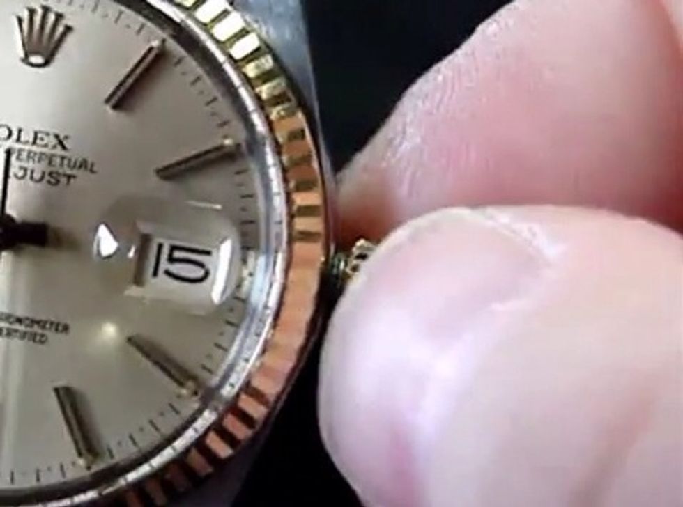 Push the crown back in and wind in a clockwise motion until it is once again in its watertight "wearing" position.