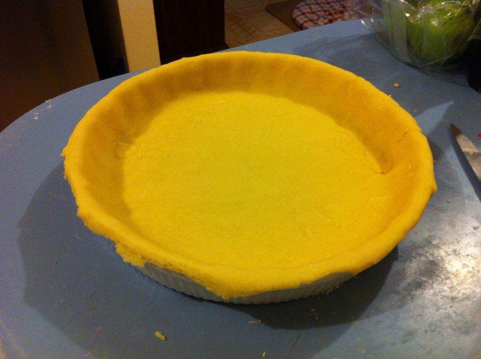 Push the inner sides down and trim the edges. Put in the fridge for 30 minutes to relax the pastry.