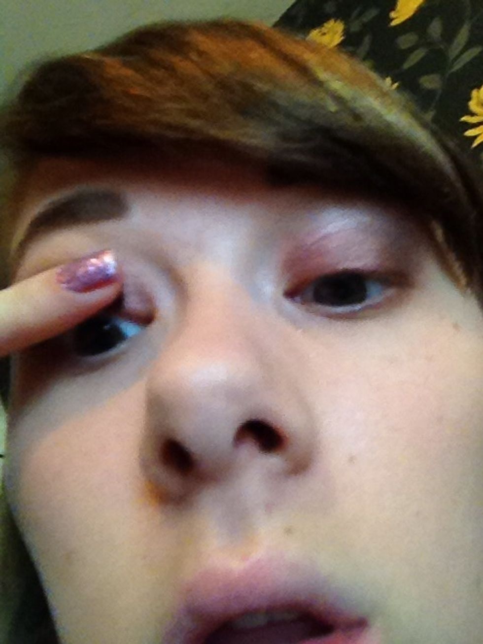 Push the lashes up with your finger