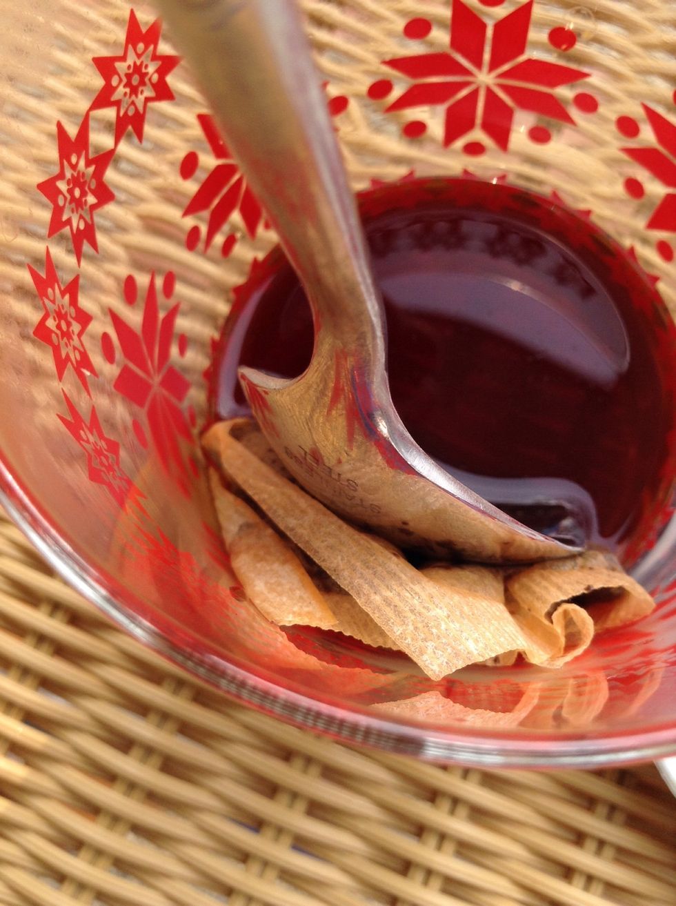 Push the tea bag to the side of the cup with a spoon to get all the darkest colored tea out