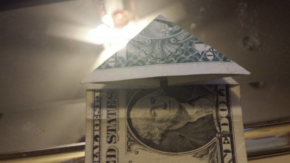 Push the top down, it should form a triangle.