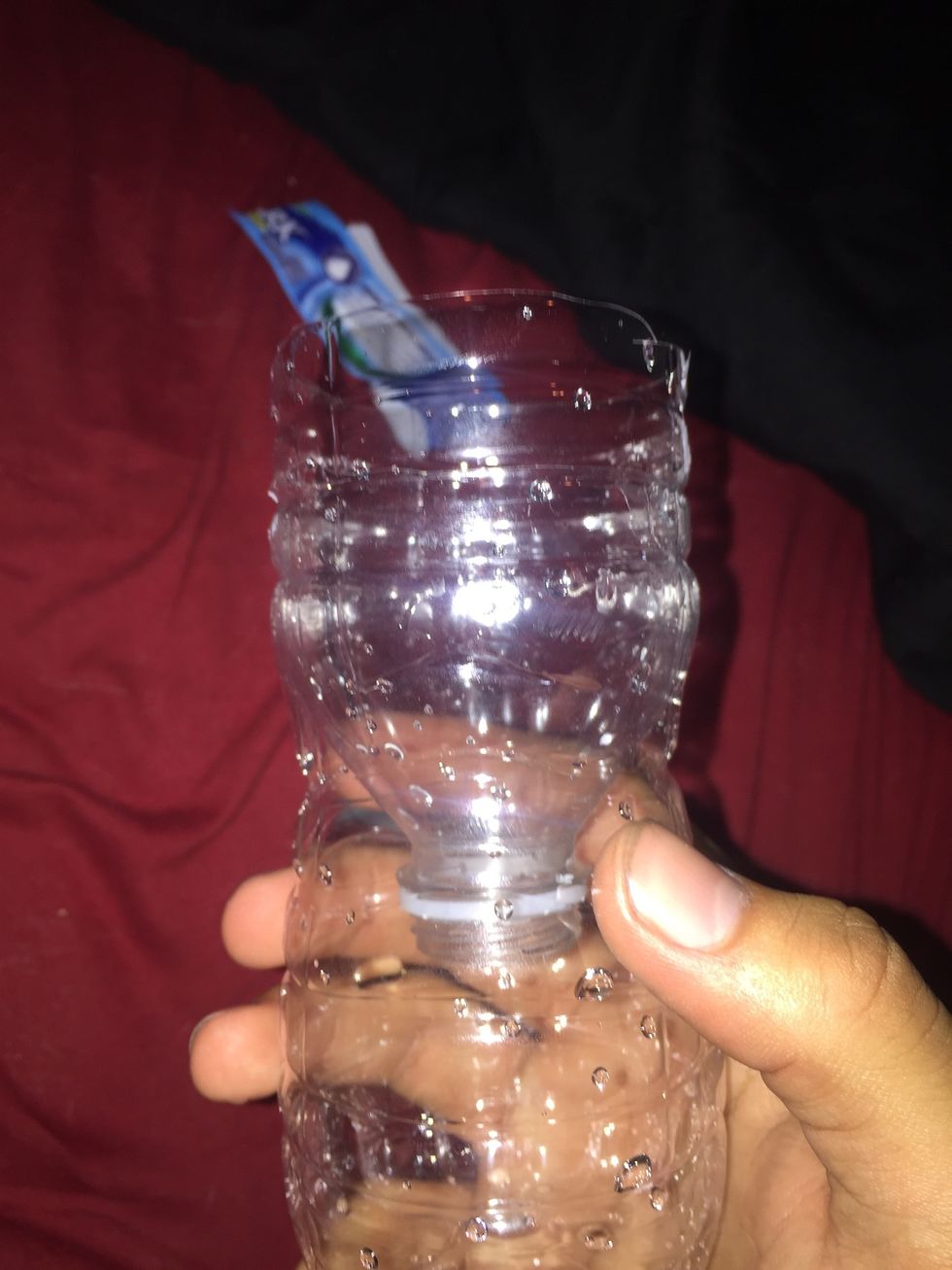 Push the top funnel, mouth side down onto the base until the ridge of the top funnel snaps into place with a ridge from the base. Push it down until you hear two snaps and it will lock into place.