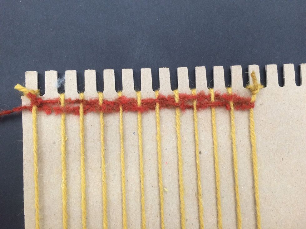 Push the yarn up so it is touching.