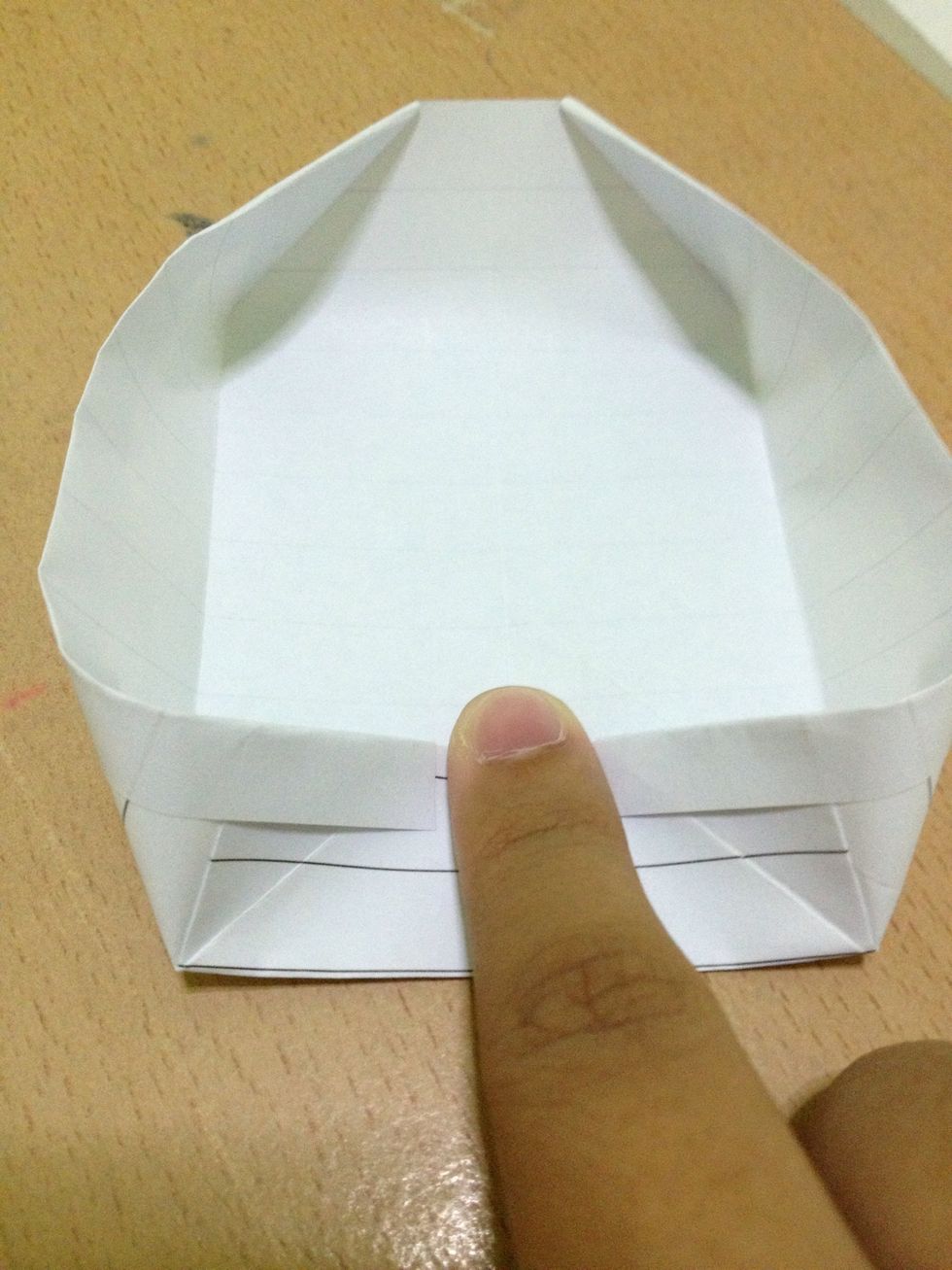 Push this part downwards (as shown).